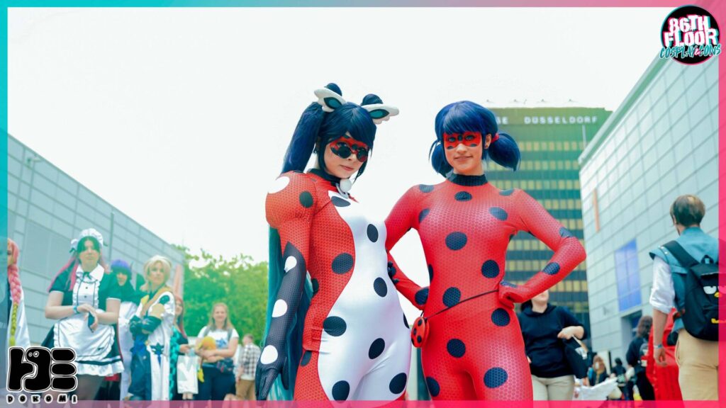 Miraculous Ladybug and Pennybug Cosplayers at Dokomi 2022
